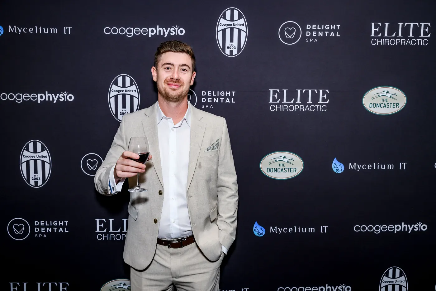 Coogee United FC Awards Night attendee with Mycelium IT branding